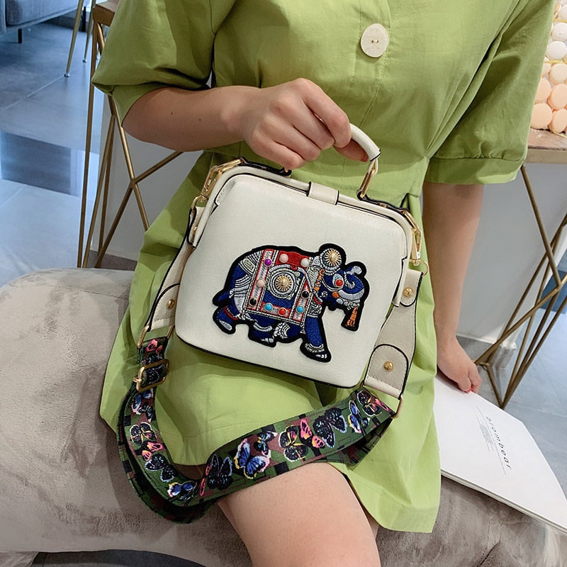 Artistic mandala embroidered women's daily bag, lightweight cotton with a secure hasp closure.