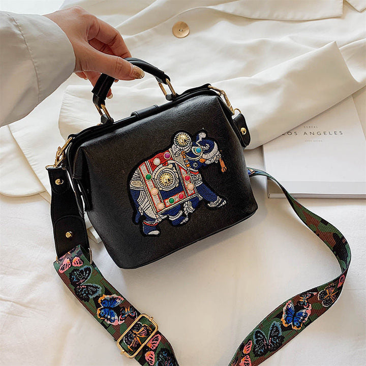 Embroidered cotton shoulder bag for women, lightweight, artistic mandala design, perfect daily bag.