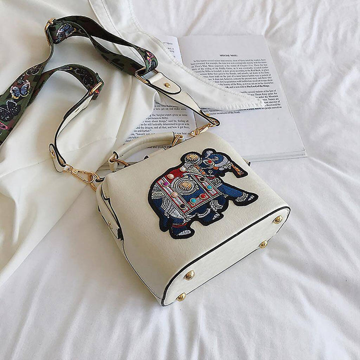 Multi-use women's bag, embroidered mandala design, lightweight cotton & secure hasp closure.