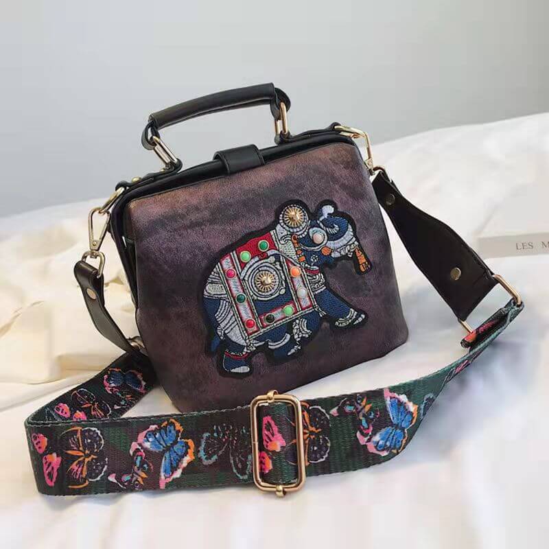 Versatile women's shoulder bag with embroidered mandala pattern, lightweight & stylish cotton.