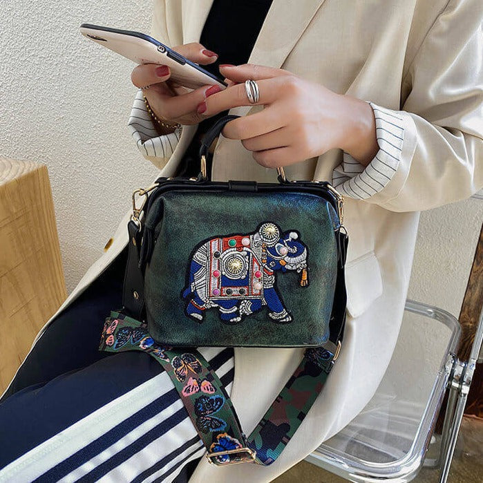Bohemian women's shoulder bag, lightweight with vibrant mandala embroidery and secure hasp.