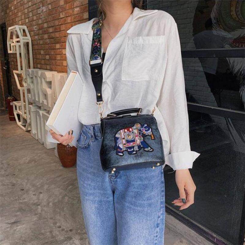 Multi-use bohemian embroidered shoulder bag for women, lightweight, artistic, cotton accessory.