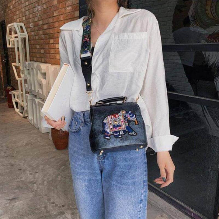 Multi-use bohemian embroidered shoulder bag for women, lightweight, artistic, cotton accessory.