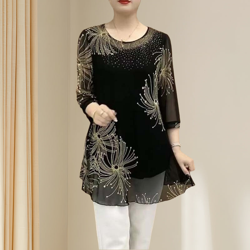 Flat lay of women's embroidered mesh round neck t-shirt, 3/4 sleeve, versatile top