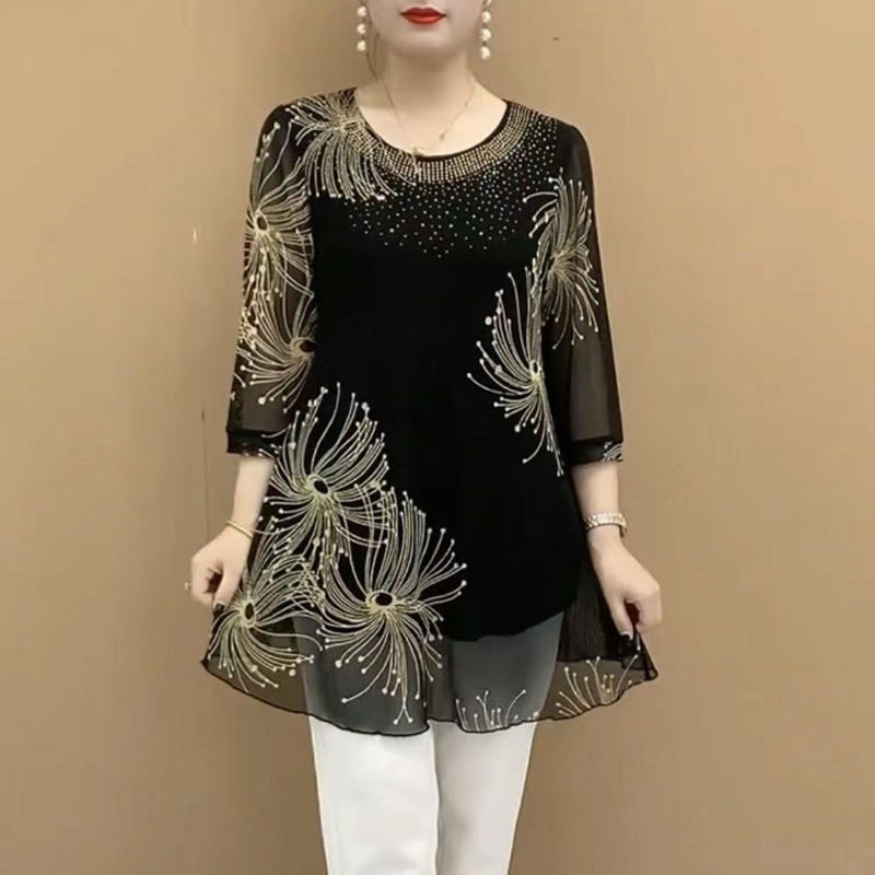 Close-up of the round neck and embroidered pattern on a women's mesh casual shirt