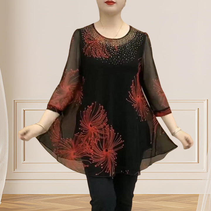Detail of the sheer mesh fabric and embroidery on a women's round neck t-shirt