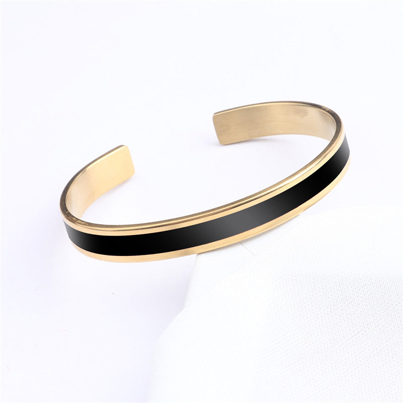 Stainless steel bangle for women, featuring a bold engraving, strong and stylish wrist accessory