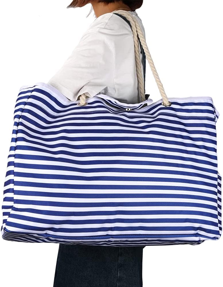 Interior pockets & bonus pouch of the organizational waterproof beach tote for essentials.