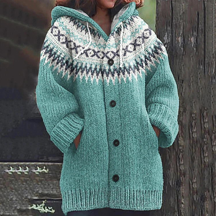 Women's Fair Isle hooded cardigan in a vibrant color, highlighting its unique knit pattern and comfortable design.