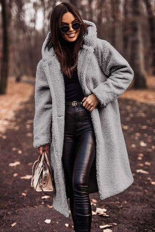 Women's hooded winter parka coat with faux fur trim, available in an array of color options