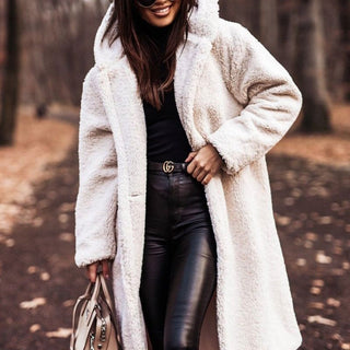 Elegant women's warm coat, a versatile faux fur hooded winter parka for cold weather fashion