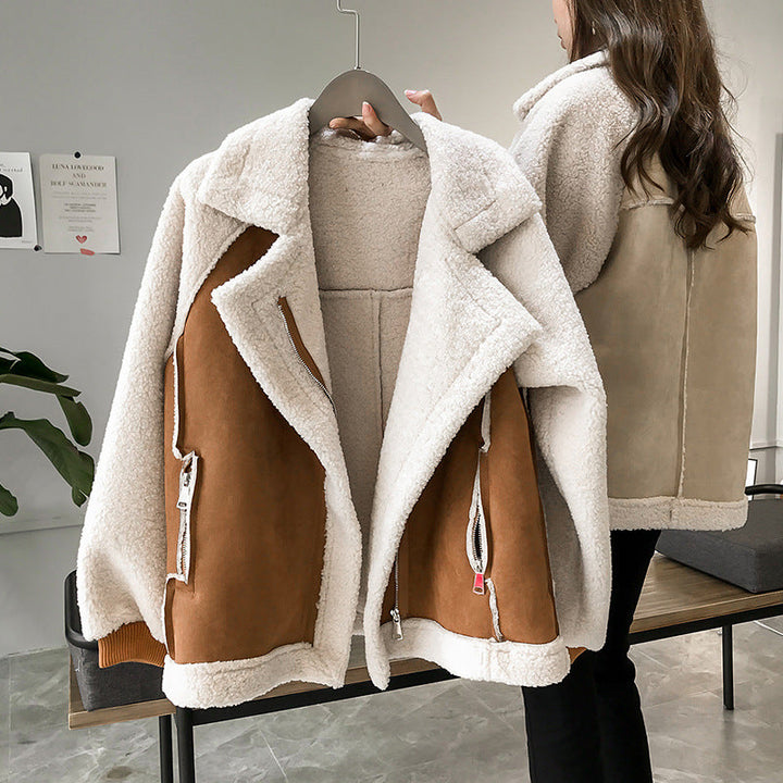 Cozy women's oversized winter coat in soft faux shearling, fashion-forward plush outerwear