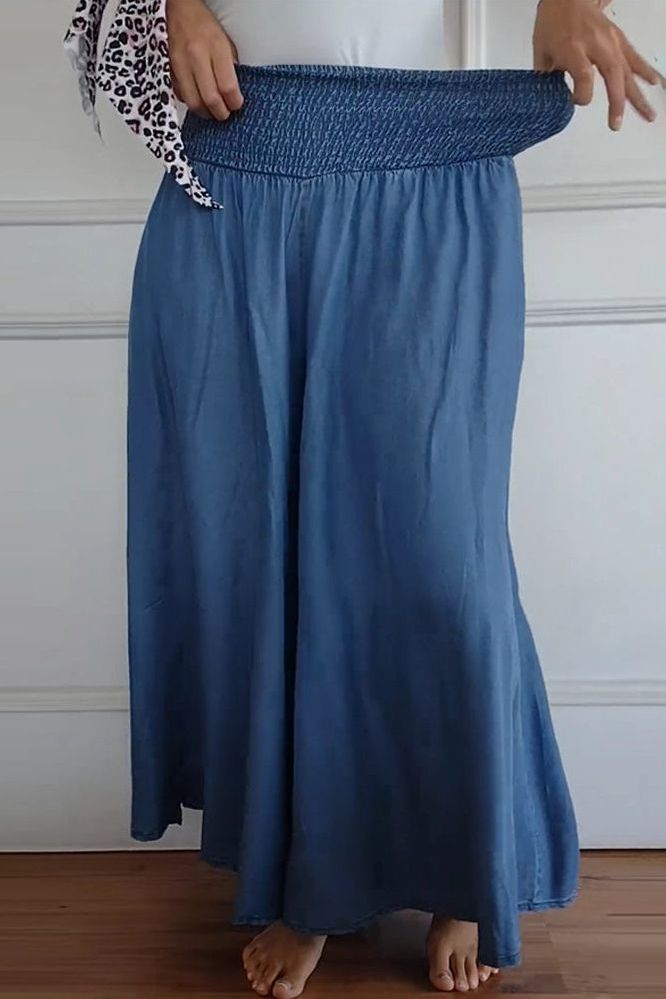 Elegant women's A-line midi skirt with high waist. Effortless style, flattering for casual & work environments.