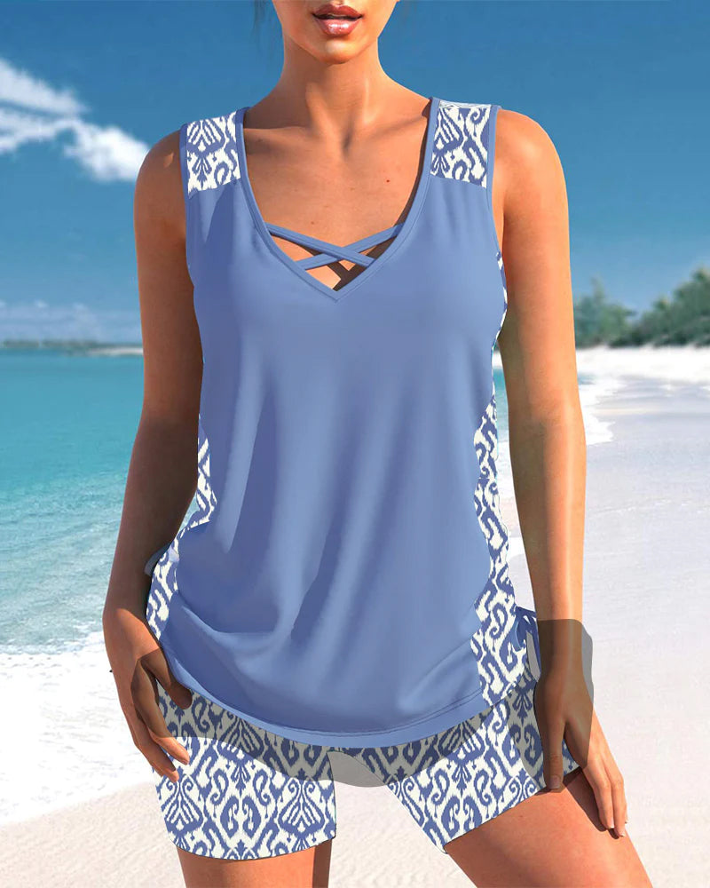 Comfortable women's tankini swimsuit set, offering modest coverage and tummy control for the beach.