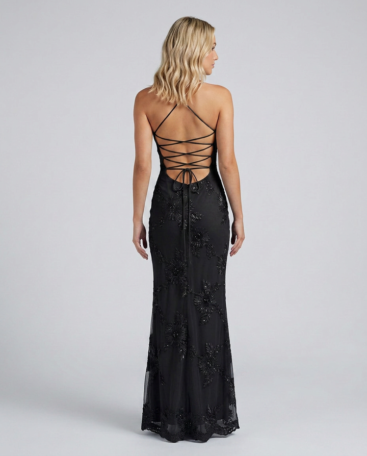 Trendy women's floral maxi dress with detailed appliqué and an eye-catching lace-up back.