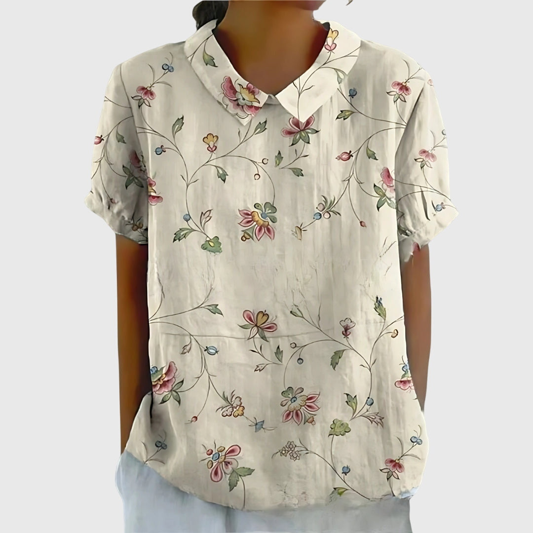 Soft fabric texture of a women's floral blouse, ensuring comfort for all-day versatile wear.