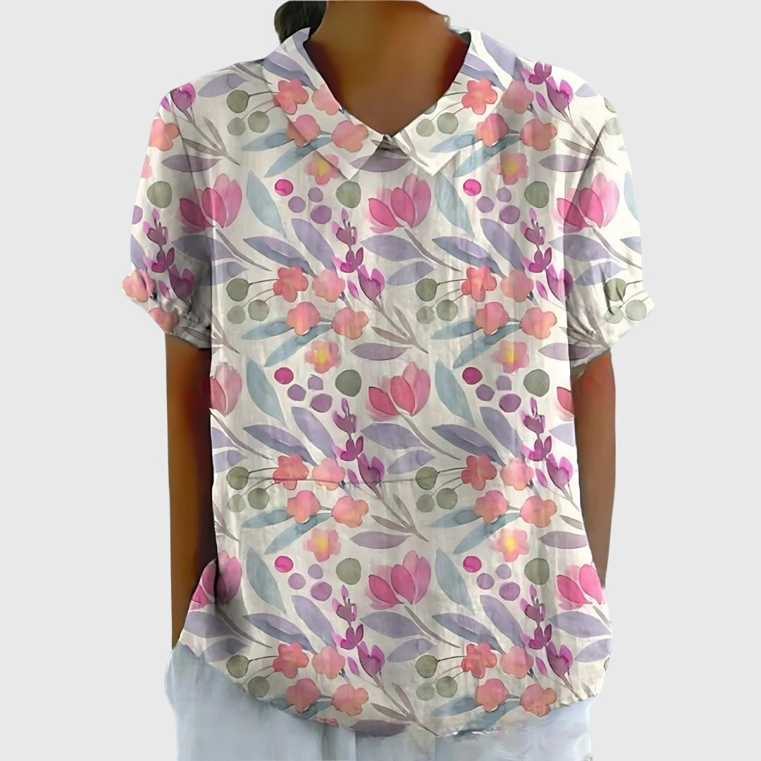 Folded women's floral top, a comfortable and stylish casual shirt for everyday wear.