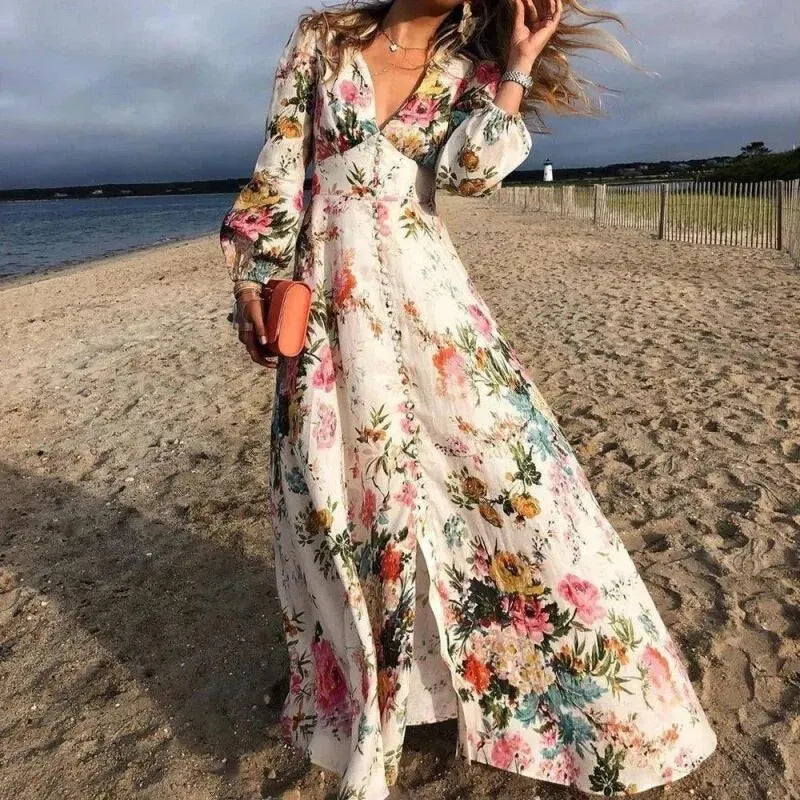 Women's floral boho maxi dress with elegant puff sleeves & V-neck, ideal for summer, beach, or spring vacation.