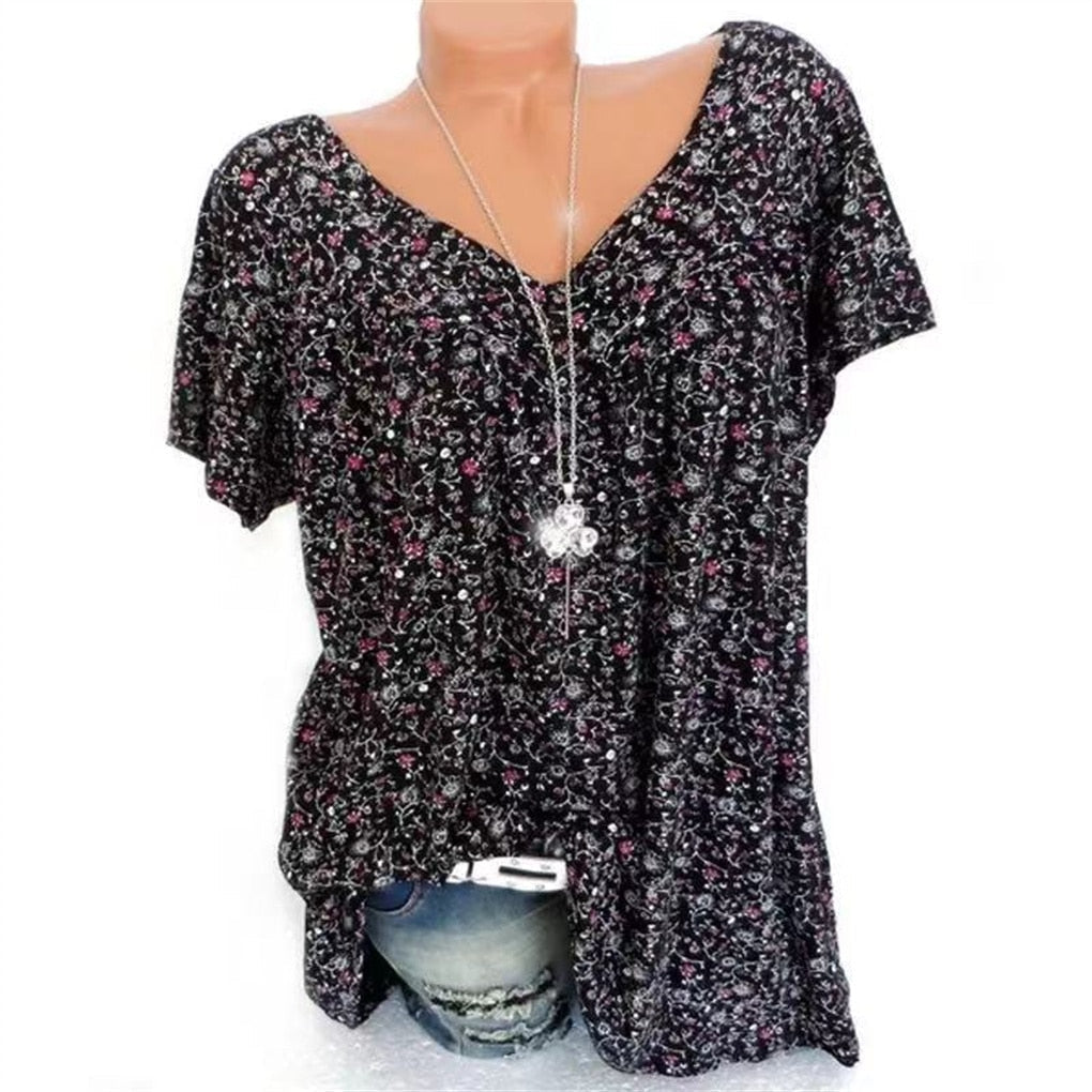 Vibrant floral print women's V-neck blouse, ideal for trendy summer casual outfits.