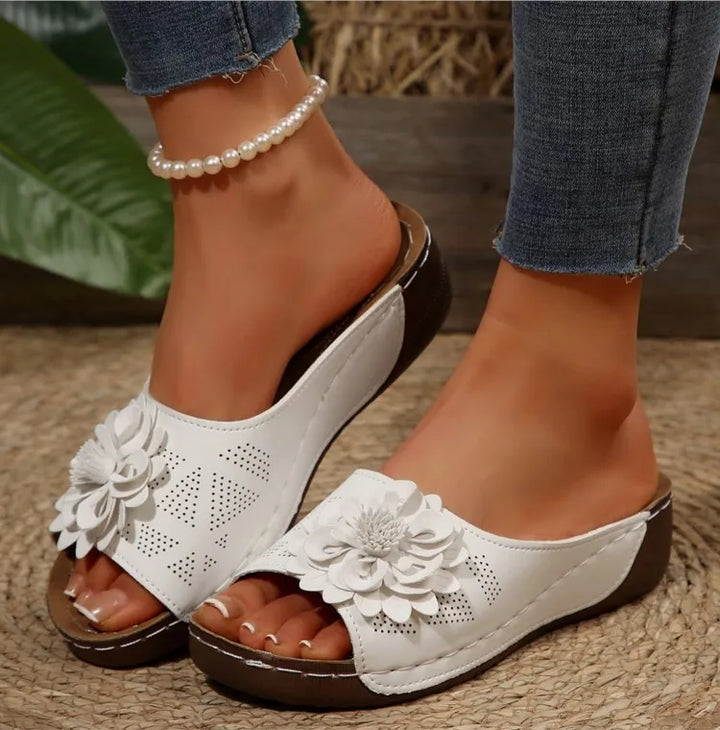 Back view of Women's Floral Comfort Slide Sandals, emphasizing the durable sole and comfort features