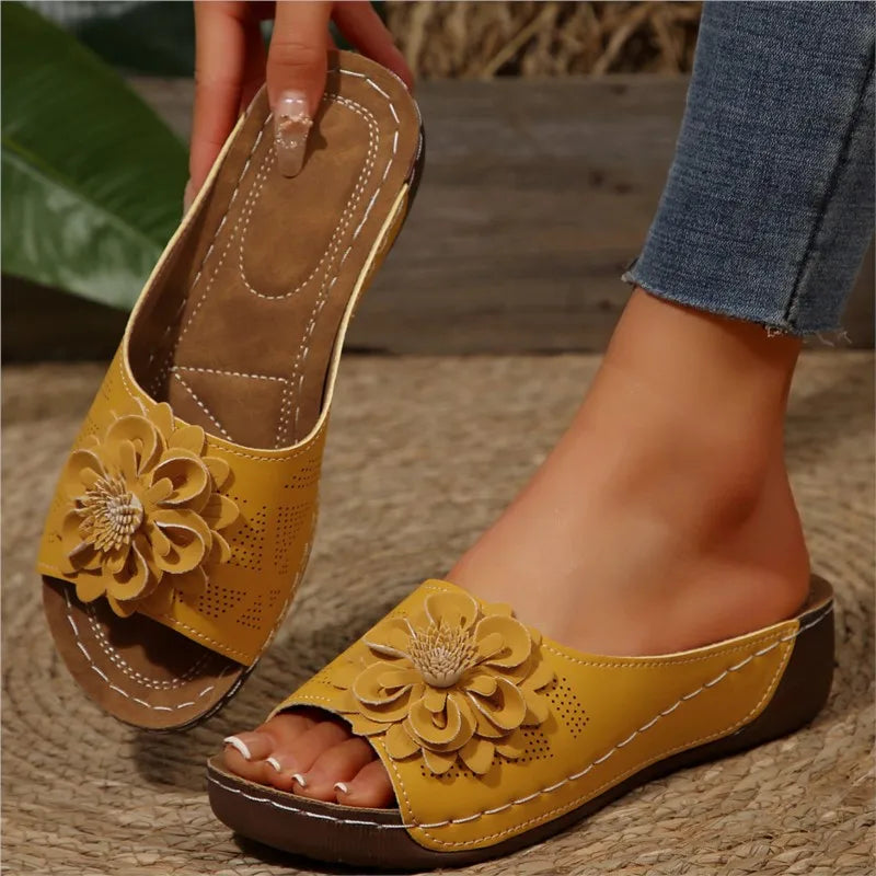 Women's summer footwear: white slide sandals adorned with charming multi-colored floral prints