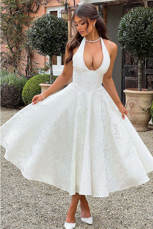 Pretty floral midi dress, perfect for a wedding guest, with halter & corset style.