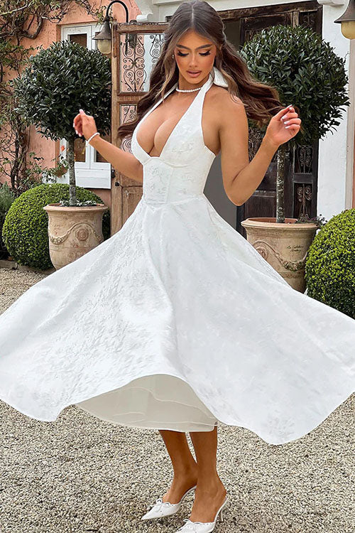 Women's stunning floral evening wear, midi length, with a chic halter & corset.