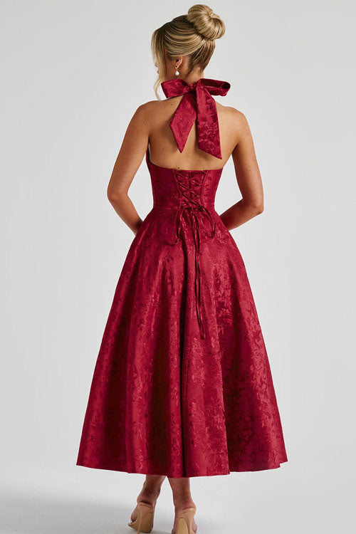 Sophisticated floral print midi dress, halter and corset, for formal events.