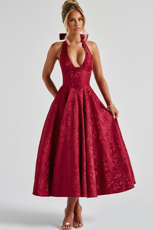 Stunning women's wedding guest dress, floral print, midi length, halter style.