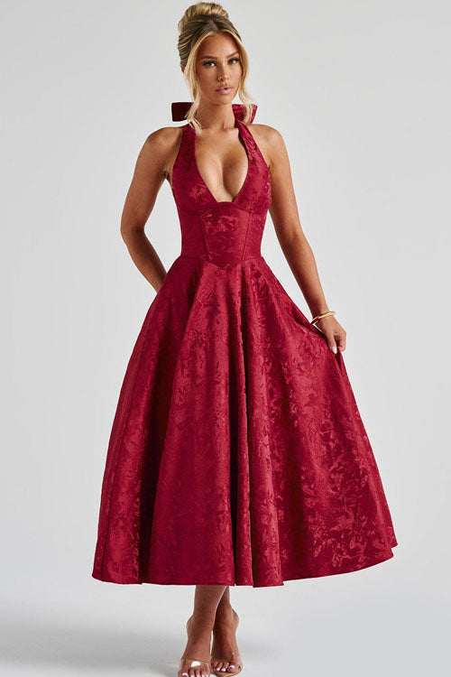 Gorgeous floral midi wedding guest dress, elegant A-line silhouette, halter neck.