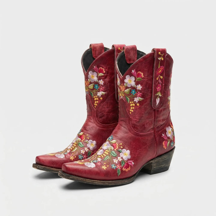 Stylish women's western ankle boots with elegant floral embroidery, pointed toe, and sturdy block heel.