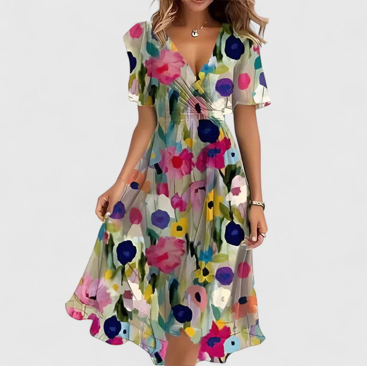 Elegant women's floral midi dress with flutter sleeves & V-neck. Cinched waist for spring/summer fashion.