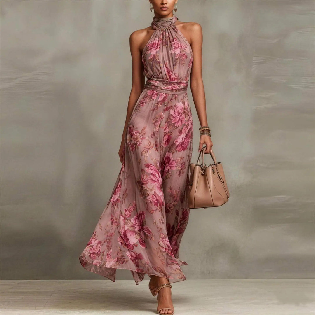 Sleeveless women's floral long maxi dress with halter neck. Flowy, elegant summer dress for beach & resort.