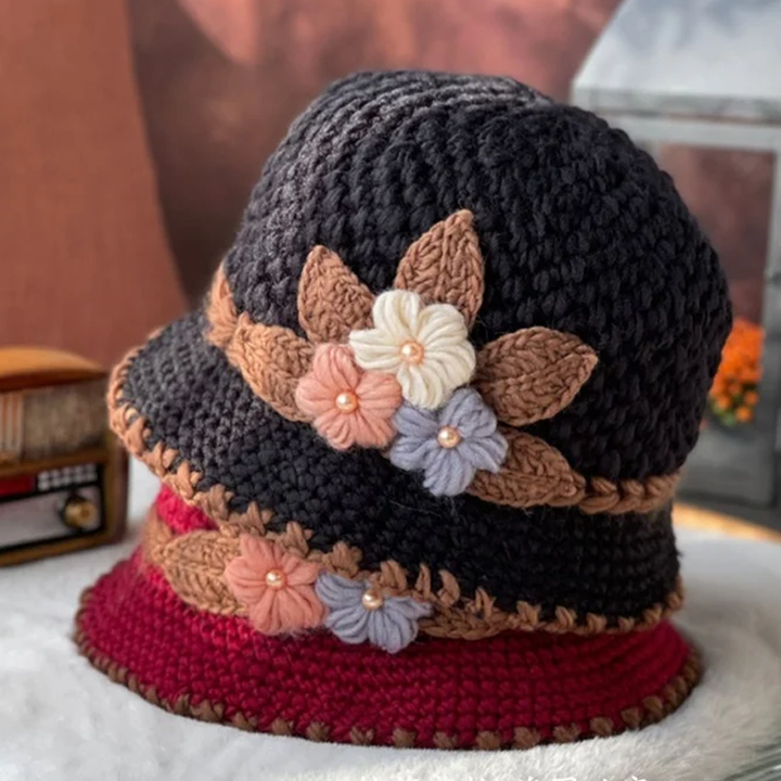 Side view of women's knit beanie, showcasing floral details on wool hat