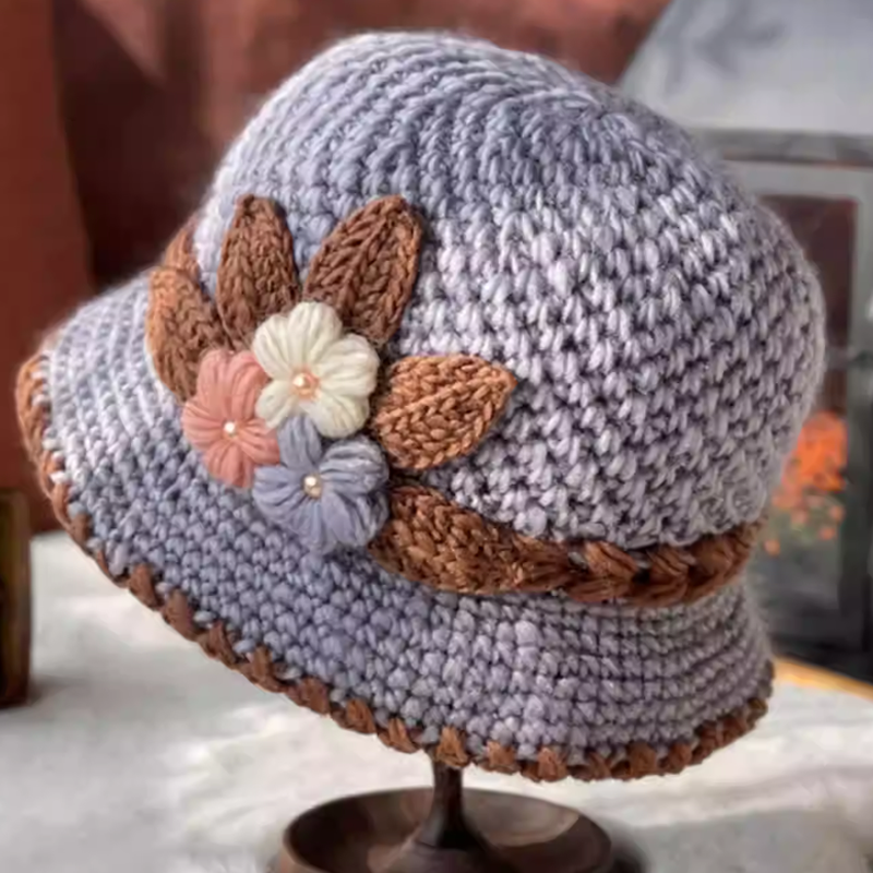 Women's cozy wool beanie with vibrant floral knit, a chic winter hat