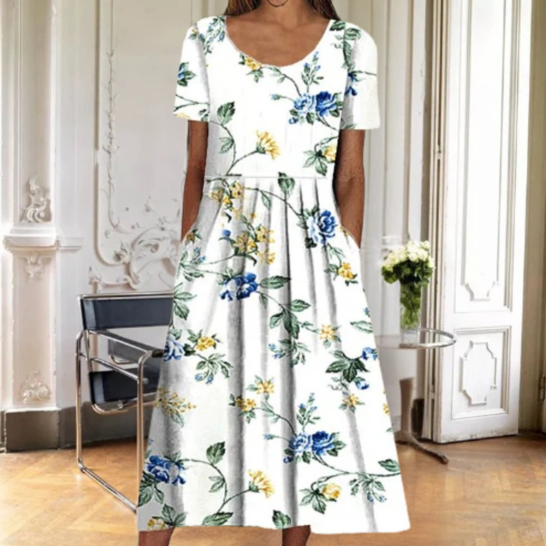 Chic women's floral midi dress with short sleeves & flowy flared hem. A versatile & elegant choice for spring-summer.
