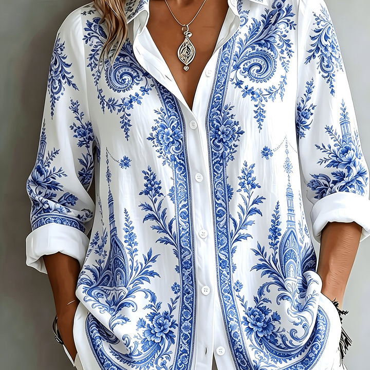 Elegant women's blouse, floral paisley print, long sleeves, an oversized and chic style.