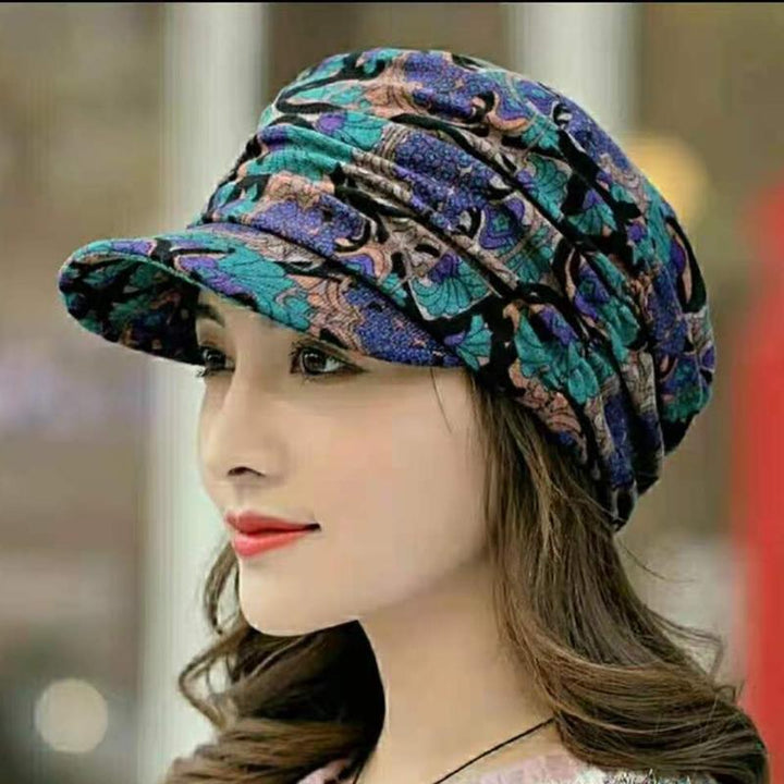 Women's floral pleated short brim cap, front view, perfect for warm winter fashion and accessories.