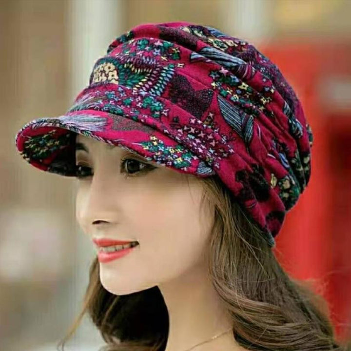 Elegant women's floral pleated short brim cap, perfect headwear for a chic winter outfit.