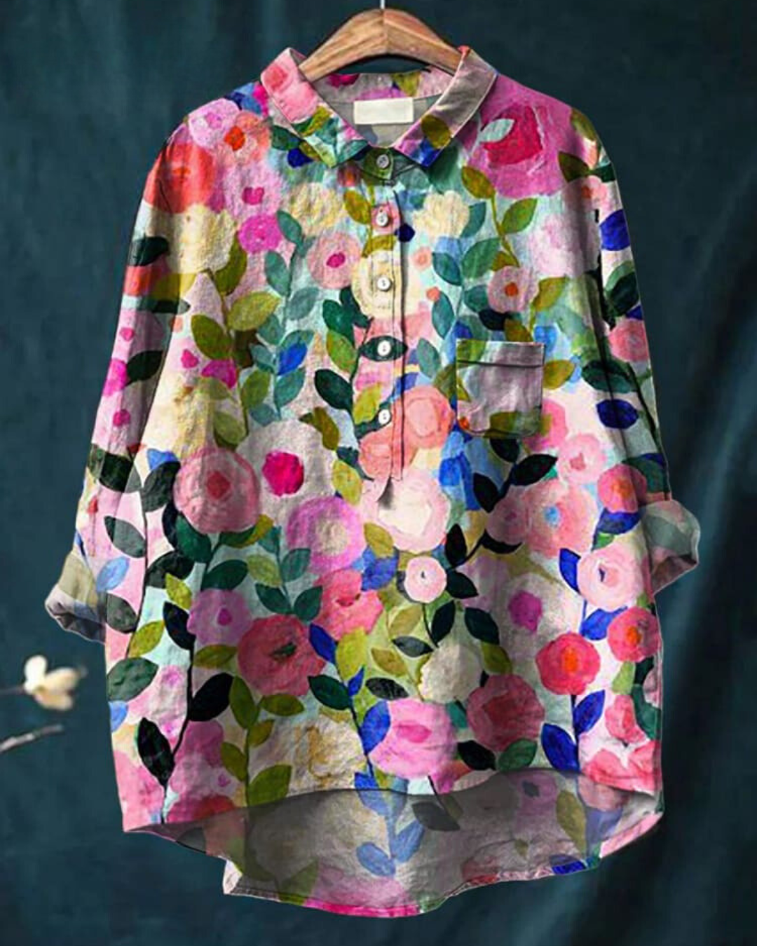 Women's floral print button-up blouse. Long sleeve casual top for everyday style.