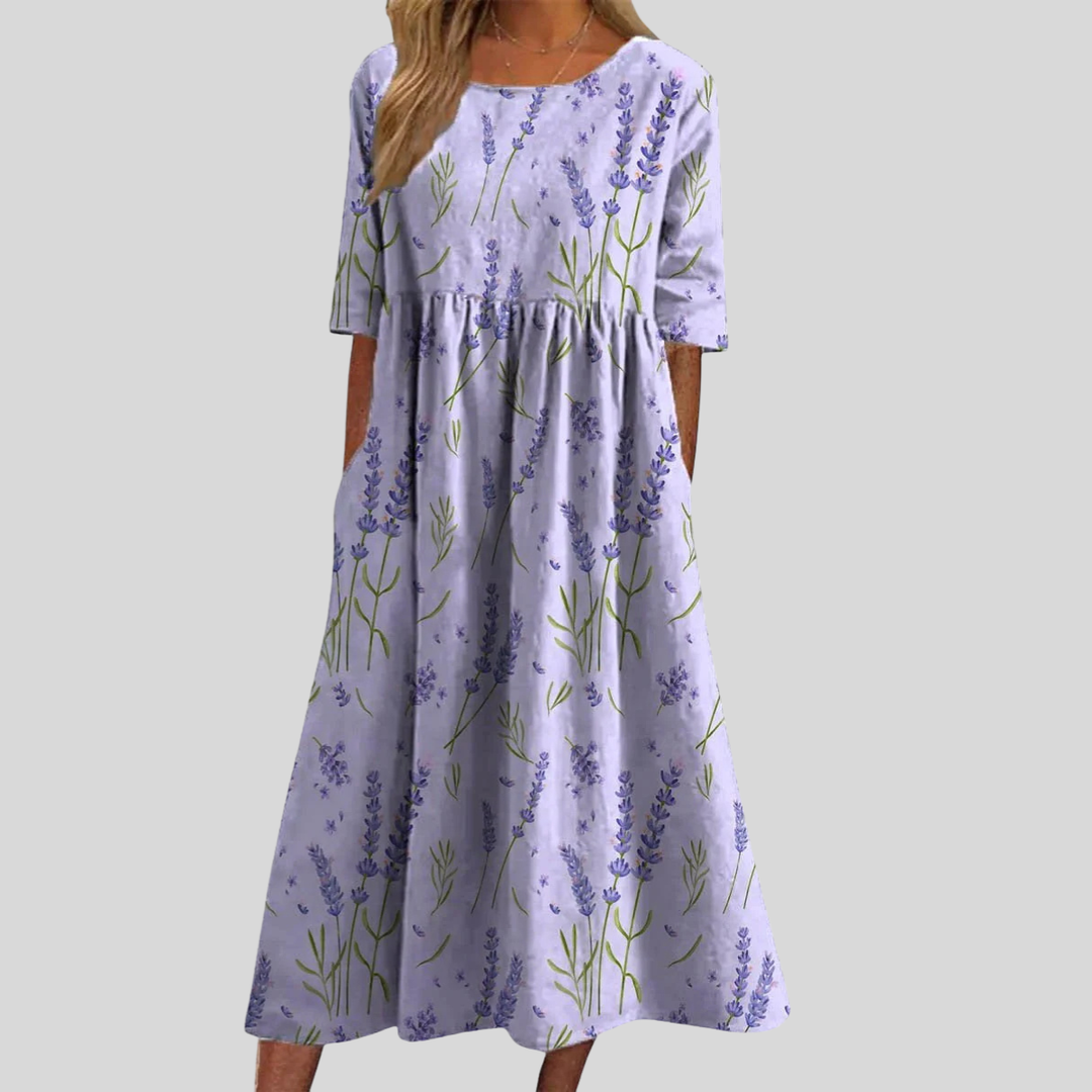Casual women's floral print midi dress with a flattering empire waist and practical side pockets.