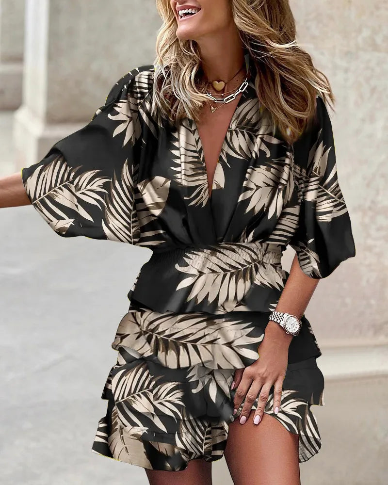 Flowy women's floral print tiered wrap midi dress with elegant ruffles & long sleeves, great for casual autumn fashion.