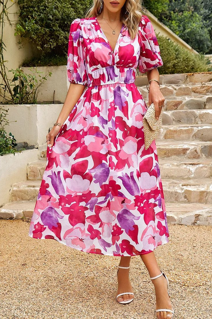 Elegant V-neck design of a women's floral puff sleeve midi dress. Versatile for summer parties & casual outings.