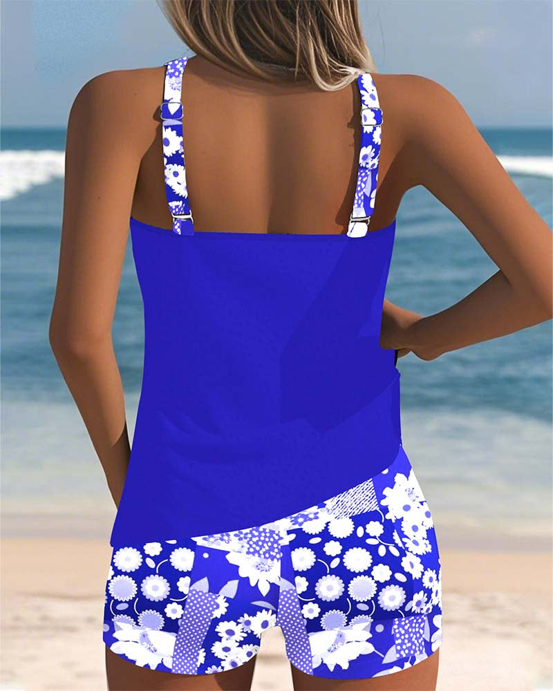 Women's modest floral racerback tankini with full-coverage boyshorts, perfect for summer.