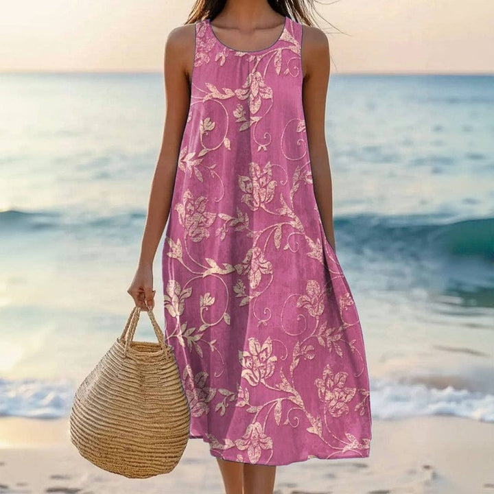 Women's floral scoop neck sleeveless oversized midi dress, ideal for comfortable casual summer or vacation wear.