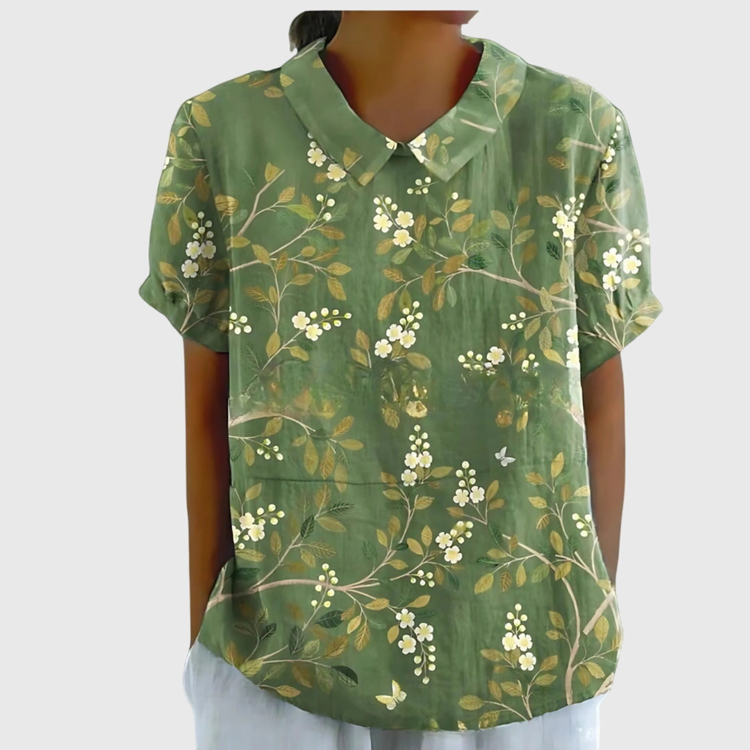 Elegant women's floral short sleeve blouse, Peter Pan collar, a perfect addition to your summer fashion wardrobe.