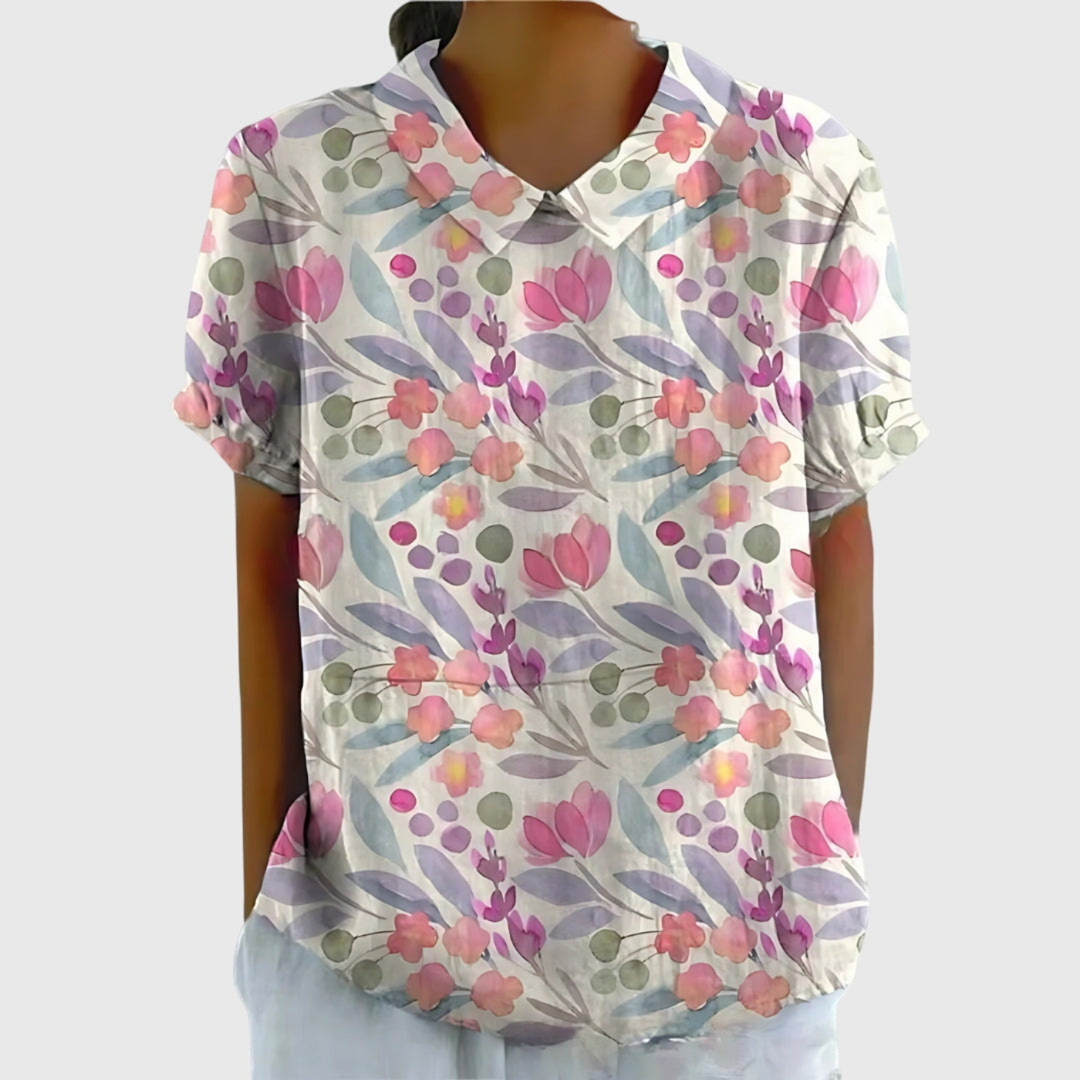 Everyday women's floral short sleeve blouse, collared and breathable, a versatile piece for warm weather casual wear.