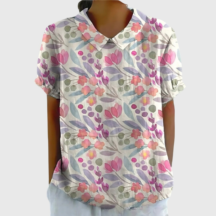 Everyday women's floral short sleeve blouse, collared and breathable, a versatile piece for warm weather casual wear.