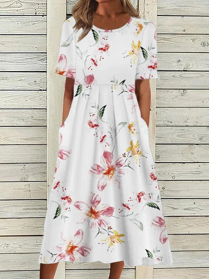 Vibrant women's floral short sleeve midi dress. Ideal for casual spring/summer wear, vacations, or a stylish brunch.