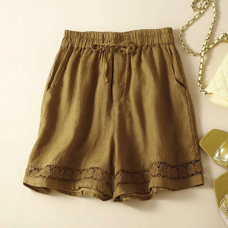 Comfortable embroidered floral shorts for women, elastic waist for a relaxed fit, perfect for casual spring daywear.